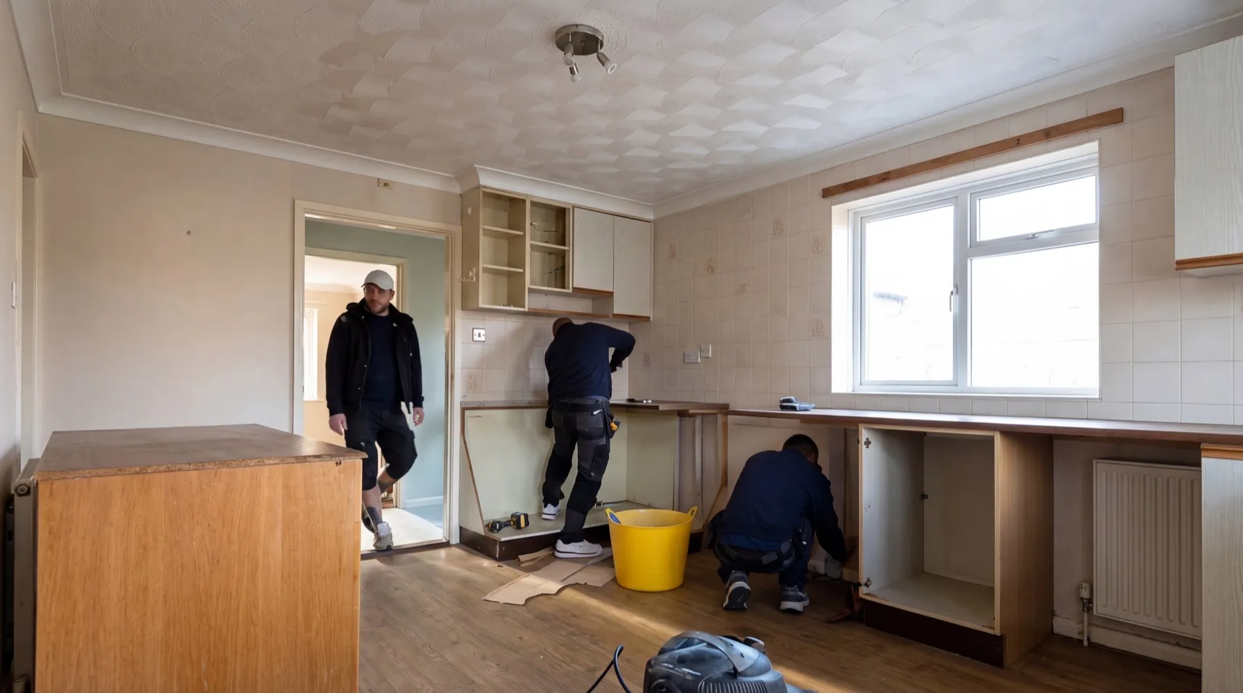 Existing kitchen during strip-out and removal