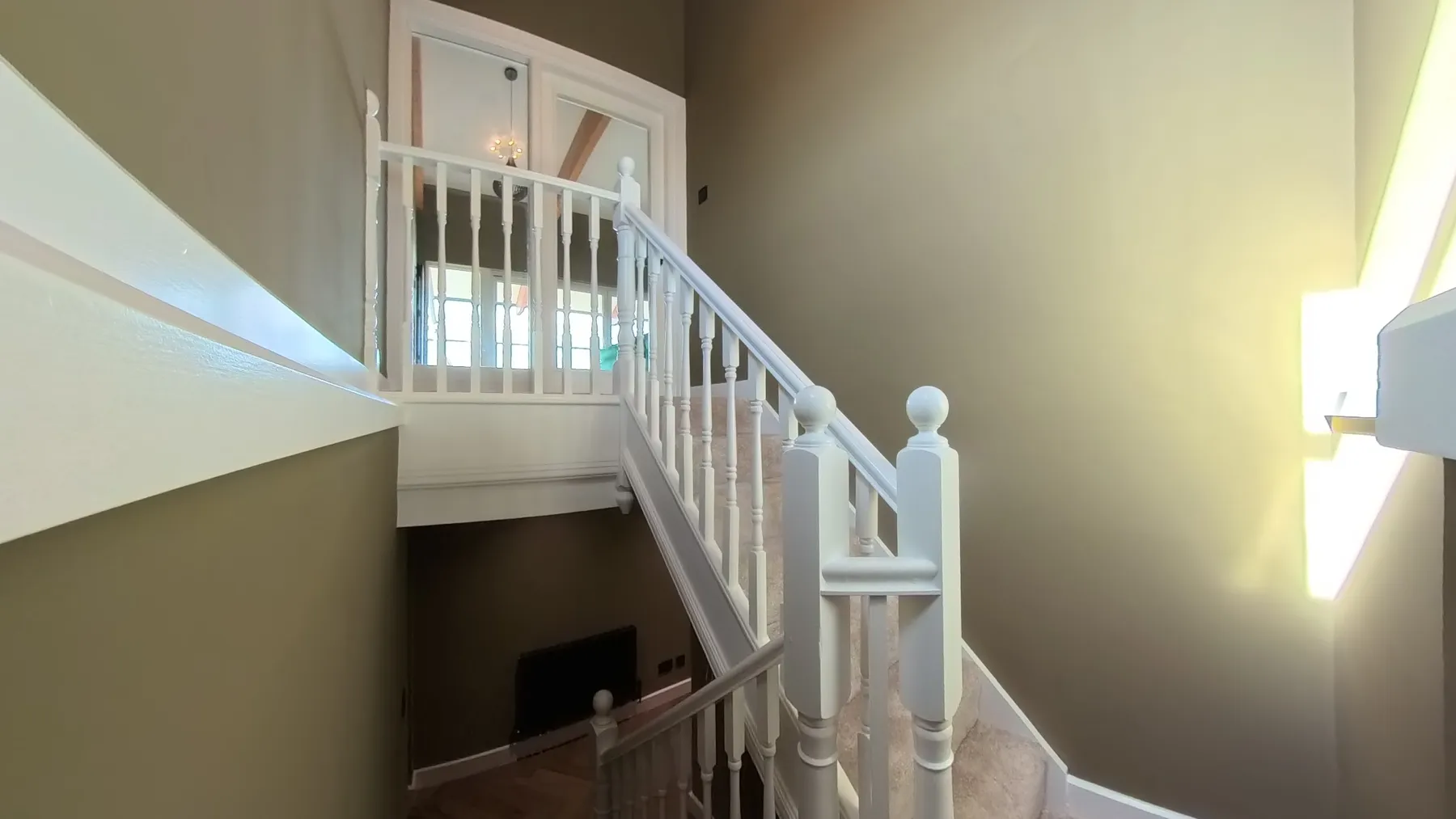 The staircase and landing after redecoration