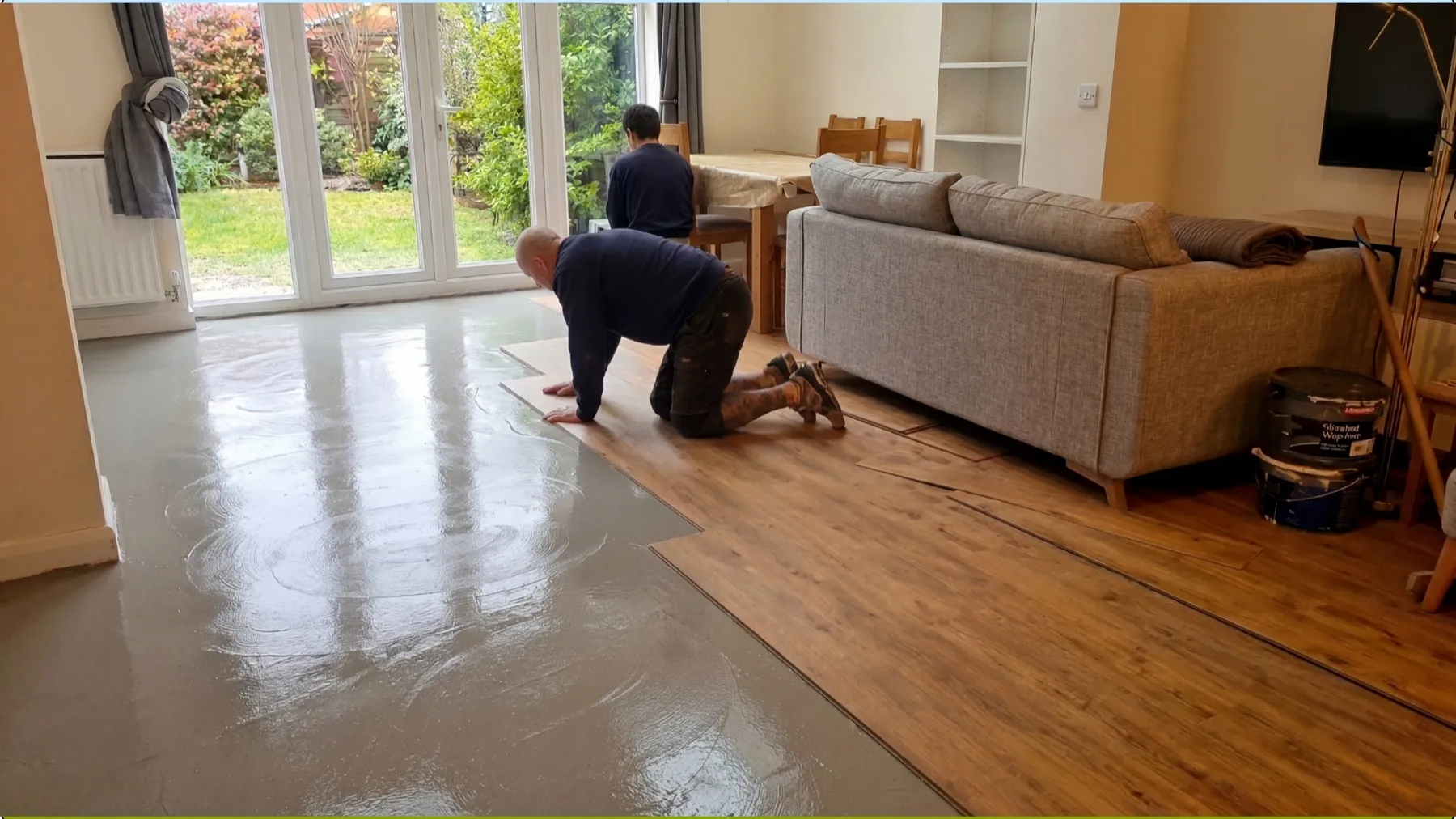 New LVT flooring being laid through the open-plan space