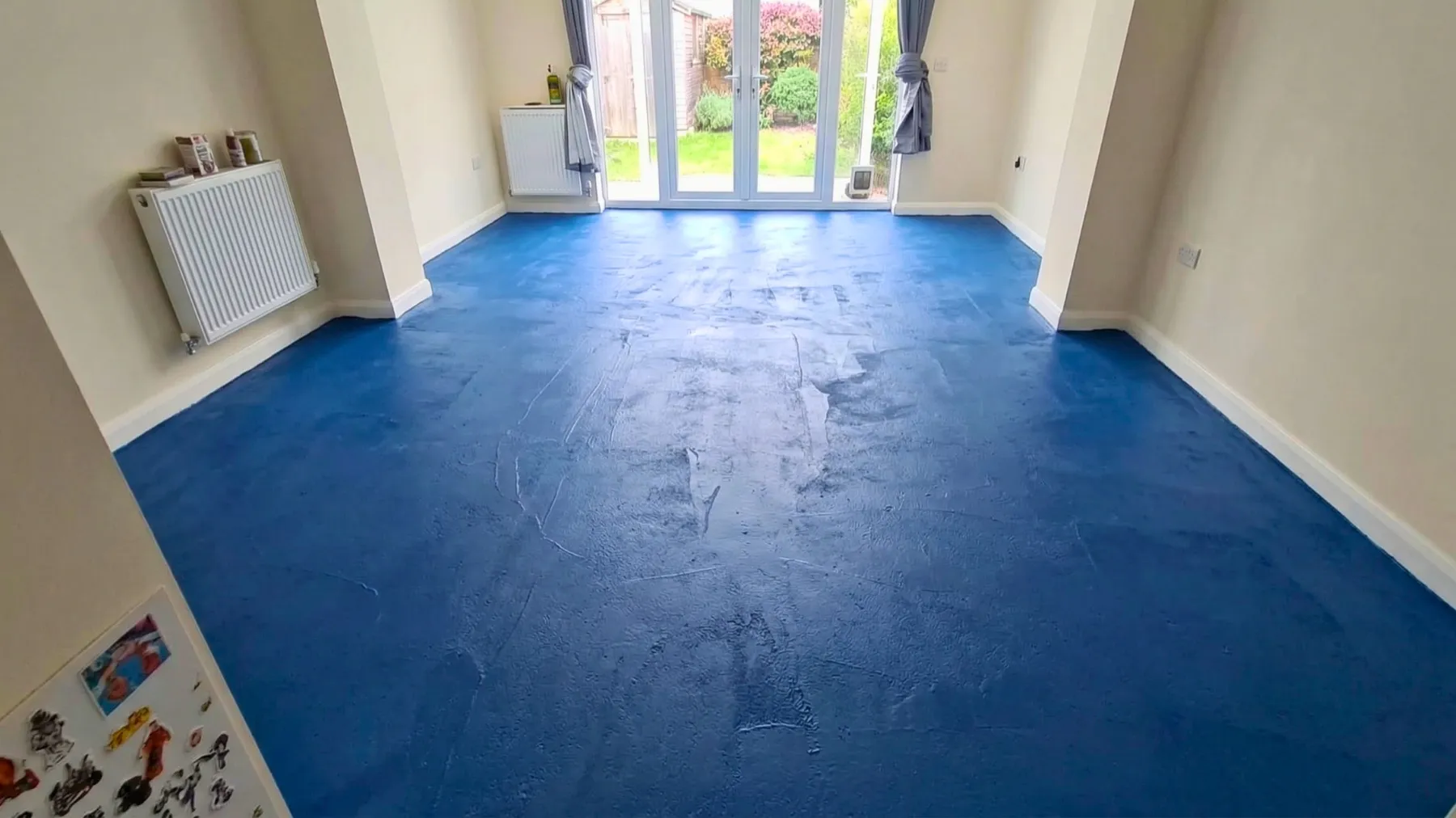 Open-plan living space in Cringleford before LVT flooring installation