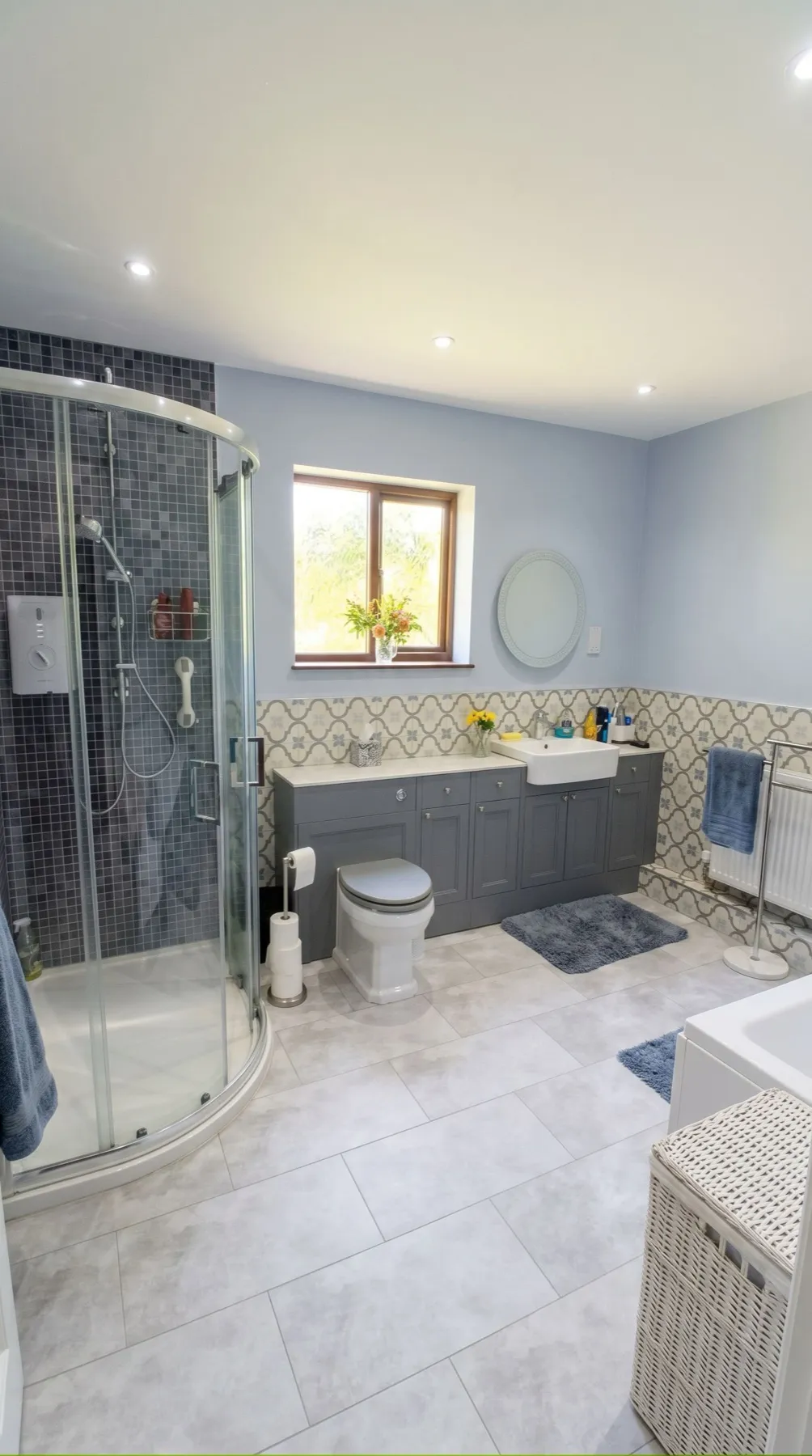 The same bathroom after a full renovation by Refined Interior Finishes